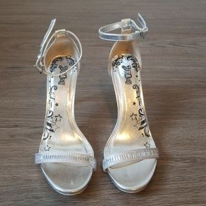 Metallic silver strap heels